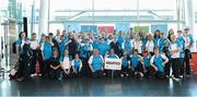 5 June 2014; The Eastern Region Aquatics team with Irish rugby players Fiona Coughlan and Marie Louise O'Reilly during the launch of Team Eastern Region for the Special Olympics Ireland Summer Games. Terminal Two, Dublin Airport, Dublin. Picture credit: Brendan Moran / SPORTSFILE