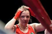 6 June 2014; Clare Grace, Ireland, shows her disappointment after defeat against England's Stacey Copeland during their 69kg Semi-Final bout. 2014 European Women’s Boxing Championships Semi-Finals, Polivalenta Hall, Bucharest, Romania. Picture credit: Pat Murphy / SPORTSFILE