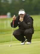 19 May 2006; Darren Clarke, Ireland, lines up a putt during round 2. Nissan Irish Open Golf Championship, Carton House Golf Club, Maynooth, Co. Kildare. Picture credit; Pat Murphy / SPORTSFILE