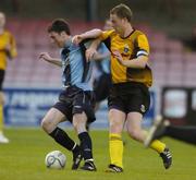 22 May 2006; Paul Shields, Dublin City ,is tackled by Tony McDonnell, UCD. eircom league, Premier Division, Dublin City v UCD, Dalymount Park, Dublin. Picture credit; Damien Eagers / SPORTSFILE