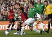 24 May 2006; Richard Dunne, Republic of Ireland, in action against Reinaldo Navia Amador, Chile. International Friendly, Republic of Ireland v Chile, Lansdowne Road, Dublin. Picture credit; David Maher / SPORTSFILE