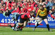 27 May 2006; John Kelly, Munster, is tackled by Marc Spcherbina, Cardiff Blues. Celtic League 2005-2006, Munster v Cardiff Blues, Thomond Park, Limerick. Picture credit: Kieran Clancy / SPORTSFILE