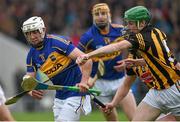4 May 2014; Patrick Maher, Tipperary, in action against Joey Holden, Kilkenny. Allianz Hurling League Division 1 Final, Tipperary v Kilkenny, Semple Stadium, Thurles, Co. Tipperary. Picture credit: Diarmuid Greene / SPORTSFILE