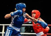 7 June 2014; Katie Taylor, Ireland, exchanges punches with Estelle Mossley, France, left, during their 60kg Final bout. 2014 European Women’s Boxing Championships Finals, Polivalenta Hall, Bucharest, Romania. Picture credit: Pat Murphy / SPORTSFILE