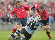 27 May 2006; Denis Fogarty, Munster, is tackled by John Yapp, Cardiff Blues. Celtic League 2005-2006, Munster v Cardiff Blues, Thomond Park, Limerick. Picture credit: Kieran Clancy / SPORTSFILE