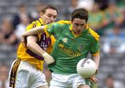 28 May 2006; Peadar Byrne, Meath, in action against Colm Morris, Wexford. Bank of Ireland Leinster Senior Football Championship, Quarter-Final, Wexford v Meath, Croke Park, Dublin. Picture credit; Brian Lawless / SPORTSFILE