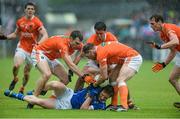 8 June 2014; Jack Brady, Cavan, surrounded by Brendan Donaghy, Stefan Campbell, Ciaran McKeever and Kieran Toner, Armagh. Ulster GAA Football Senior Championship, Quarter-Final, Armagh v Cavan, Athletic Grounds, Armagh. Picture credit: Oliver McVeigh / SPORTSFILE