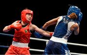 7 June 2014; Katie Taylor, Ireland, exchanges punches with Estelle Mossley, France, right, during their 60kg Final bout. 2014 European Women’s Boxing Championships Finals, Polivalenta Hall, Bucharest, Romania. Picture credit: Pat Murphy / SPORTSFILE