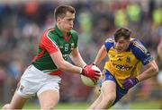 8 June 2014; Cillian O'Connor, Mayo, in action against Neil Collins, Roscommon. Connacht GAA Football Senior Championship, Semi-Final, Roscommon v Mayo, Dr. Hyde Park, Roscommon. Picture credit: Matt Browne / SPORTSFILE