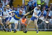 4 June 2006; Tom Feeney, Waterford, in action against Diarmaid Fitzgerald, Tipperary. Guinness Munster Senior Hurling Championship, Semi-Final, Waterford v Tipperary, Pairc Ui Chaoimh, Cork. Picture credit; Pat Murphy / SPORTSFILE