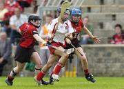 4 June 2006; Sinead Cassidy, Derry, in action against Jennifer Braniff, left, and Karen McMullan, Down. Bank of Ireland Ulster Junior Championship Final. Donegal v Down, McCool Park, Ballybofey, Co. Donegal. Picture credit; Brian Lawless / SPORTSFILE