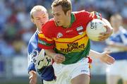 4 June 2006; Trevor Smith, Carlow, in action against Donal Brennan, Laois. Bank of Ireland Leinster Senior Football Championship, Quarter-Final, Laois v Carlow, O'Moore Park, Portlaoise, Co. Laois. Picture credit; Matt Browne / SPORTSFILE