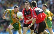 4 June 2006; Dan Gordon, Down, in action against Ciaran Bonner, Donegal. Bank of Ireland Ulster Senior Football Championship, First Round, Donegal v Down, McCool Park, Ballybofey, Co. Donegal. Picture credit; Brian Lawless / SPORTSFILE