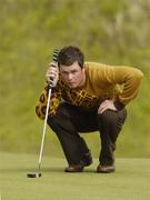 5 June 2006; Jonathan Caldwell, Clandeboye, lines up a putt on the 3rd green during the East of Ireland Amateur Open Championship. Co. Louth Golf Club, Baltray, Co. Louth. Picture credit: Pat Murphy / SPORTSFILE