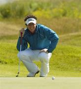 11 June 2006; Rory McIlroy, Holywood G.C., lines up a putt on the 6th green during the second round of the Irish Amateur Close Championship. European Club Golf Club, Brittas Bay, Co. Wicklow. Picture credit: Pat Murphy / SPORTSFILE