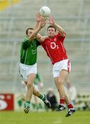 11 June 2006; Derek Kavanagh, Cork, in action against Timmy Carroll, Limerick. Bank of Ireland Munster Senior Football Championship, Semi-Final, Limerick v Cork, Gaelic Grounds, Limerick. Picture credit: Brian Lawless / SPORTSFILE