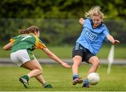 15 May 2014; Nicole Owens, Dublin, scores her side's third goal despite the efforts of Emma Troy, Meath. Aisling McGing Ladies U21 Football Final, Dublin v Meath, Clane, Co. Kildare. Picture credit: Piaras Ó Mídheach / SPORTSFILE