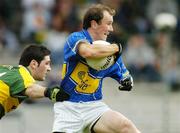 11 June 2006; Andrew Morrissey, Tipperary, is tackled by Bryan Sheehan, Kerry. Bank of Ireland Munster Senior Football Championship, Semi-Final, Kerry v Tipperary, Fitzgerald Stadium, Killarney, Co. Kerry. Picture credit: Brendan Moran / SPORTSFILE