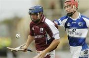 17 June 2006; Damien Hayes, Galway, in action against Brian Campion, Laois. Guinness All-Ireland Senior Hurling Championship Qualifier, Round 1, Laois v Galway, O'Moore Park, Portlaoise, Co. Laois. Picture credit: Brian Lawless / SPORTSFILE