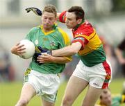 18 June 2006; Niall McLoughlin, Meath, in action against Patrick Hickey, Carlow. Bank of Ireland All-Ireland Senior Football Championship Qualifier, Round 1, Carlow v Meath, Dr. Cullen Park, Carlow. Picture credit: Damien Eagers / SPORTSFILE