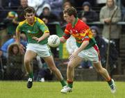 18 June 2006; Jamews Ryan, Carlow, in action against Brian Farrell, Meath. Bank of Ireland All-Ireland Senior Football Championship Qualifier, Round 1, Carlow v Meath, Dr. Cullen Park, Carlow. Picture credit: Damien Eagers / SPORTSFILE