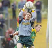 18 June 2006; Meath goalkeeper Brendan Murphy claims the ball, as Carlow's John Fitzgerald challenges Meath's Kevin Reilly. Bank of Ireland All-Ireland Senior Football Championship Qualifier, Round 1, Carlow v Meath, Dr. Cullen Park, Carlow. Picture credit: Damien Eagers / SPORTSFILE