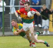 18 June 2006; Simon Rea, Carlow, in action against Niall McLoughlin, Meath. Bank of Ireland All-Ireland Senior Football Championship Qualifier, Round 1, Carlow v Meath, Dr. Cullen Park, Carlow. Picture credit: Damien Eagers / SPORTSFILE