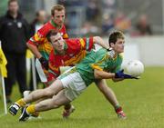 18 June 2006; Mairtin Doran, Meath, in action against Simon Rea, Carlow. Bank of Ireland All-Ireland Senior Football Championship Qualifier, Round 1, Carlow v Meath, Dr. Cullen Park, Carlow. Picture credit: Damien Eagers / SPORTSFILE