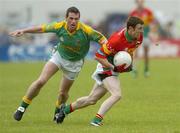18 June 2006; Alan Kelly, Carlow, in action against John Donoghue, Meath. Bank of Ireland All-Ireland Senior Football Championship Qualifier, Round 1, Carlow v Meath, Dr. Cullen Park, Carlow. Picture credit: Damien Eagers / SPORTSFILE