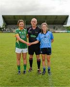 15 May 2014; Referee Eugene O'Hara with captains Máire O'Shaughnessy, Meath, and Siobhán Woods, Dublin, before the game. Aisling McGing Ladies U21 Football Final, Dublin v Meath, Clane, Co. Kildare. Picture credit: Piaras Ó Mídheach / SPORTSFILE