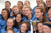 15 May 2014; Dublin players celebrate with the Aisling McGing Cup after the game. Aisling McGing Ladies U21 Football Final, Dublin v Meath, Clane, Co. Kildare. Picture credit: Piaras Ó Mídheach / SPORTSFILE