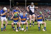 4 May 2014; The Tipperary players prepare for the team photograph. Allianz Hurling League Division 1 Final, Tipperary v Kilkenny, Semple Stadium, Thurles, Co. Tipperary. Picture credit: Ray McManus / SPORTSFILE