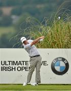 19 June 2014; Paul McGinley plays from the 11th tee box during day 1 of the 2014 Irish Open Golf Championship. Fota Island, Cork. Picture credit: Diarmuid Greene / SPORTSFILE