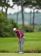 19 June 2014; Graeme McDowell putts on the 10th green during day 1 of the 2014 Irish Open Golf Championship. Fota Island, Cork. Picture credit: Diarmuid Greene / SPORTSFILE