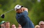 19 June 2014; Shane Lowry watches his drive from the 10th tee box during day 1 of the 2014 Irish Open Golf Championship. Fota Island, Cork. Picture credit: Diarmuid Greene / SPORTSFILE