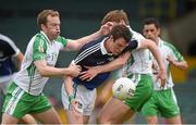 21 June 2014; Ian Ryan, Limerick, in action against Brian Collins and Philip Butler, London. GAA Football All-Ireland Senior Championship, Round 1A, Limerick v London, Gaelic Grounds, Limerick. Picture credit: Ray McManus / SPORTSFILE