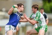 21 June 2014; Ian Ryan, Limerick, in action against Philip Butler, London. GAA Football All-Ireland Senior Championship, Round 1A, Limerick v London, Gaelic Grounds, Limerick. Picture credit: Ray McManus / SPORTSFILE