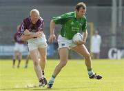 1 July 2006; Timmy Carroll, Limerick, in action against Donal O'Donoghue, Westmeath. Bank of Ireland All-Ireland Senior Football Championship Qualifier, Round 2, Westmeath v Limerick, Cusack Park, Mullingar, Co. Westmeath. Picture credit: Damien Eagers / SPORTSFILE