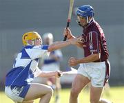 1 July 2006; Brendan Murtagh, Westmeath, in action against Cahir Healy, Laois. Guinness All-Ireland Senior Hurling Championship Qualifier, Round 2, Westmeath v Laois, Cusack Park, Mullingar, Co. Westmeath. Picture credit: Damien Eagers / SPORTSFILE