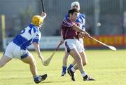 1 July 2006; Barry Kennedy, Westmeath, in action against Cahir Healy, Laois. Guinness All-Ireland Senior Hurling Championship Qualifier, Round 2, Westmeath v Laois, Cusack Park, Mullingar, Co. Westmeath. Picture credit: Damien Eagers / SPORTSFILE