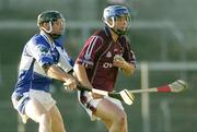 1 July 2006; Brendan Murtagh, Westmeath, in action against Tommy Fitzgerald, Laois. Guinness All-Ireland Senior Hurling Championship Qualifier, Round 2, Westmeath v Laois, Cusack Park, Mullingar, Co. Westmeath. Picture credit: Damien Eagers / SPORTSFILE