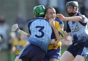 1 July 2006; Colin Lynch, Clare, is tackled by Kevin Ryan, 3, and Ronan Fallon, Dublin. Guinness All-Ireland Senior Hurling Championship Qualifier, Round 2, Dublin v Clare, Parnell Park, Dublin. Picture credit: Ray Lohan / SPORTSFILE