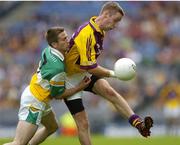 2 July 2006; Matty Forde, Wexford, in action against Karol Slattery, Offaly. Bank of Ireland Leinster Senior Football Championship Semi-Final, Offaly v Wexford, Croke Park, Dublin. Picture credit: Aoife Rice / SPORTSFILE