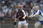 2 July 2006; Ollie Canning, Galway, in a race for possession with John Mullane, Waterford. Guinness All-Ireland Senior Hurling Championship Qualifier, Round 2, Waterford v Galway, Walsh Park, Waterford. Picture credit: Brendan Moran / SPORTSFILE