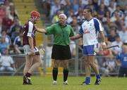 2 July 2006; Referee Sean McMahon attempts to calm things down between David Hayes, Galway, and Dan Shanahan, Waterford. Guinness All-Ireland Senior Hurling Championship Qualifier, Round 2, Waterford v Galway, Walsh Park, Waterford. Picture credit: Brendan Moran / SPORTSFILE