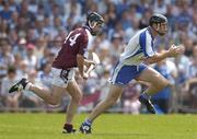 2 July 2006; Tom Feeney, Waterford, races clear of Richie Murray, Galway. Guinness All-Ireland Senior Hurling Championship Qualifier, Round 2, Waterford v Galway, Walsh Park, Waterford. Picture credit: Brendan Moran / SPORTSFILE