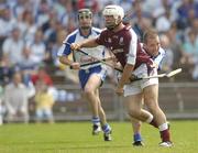 2 July 2006; Ger Farragher, Galway, is tackled by Ken McGrath, Waterford. Guinness All-Ireland Senior Hurling Championship Qualifier, Round 2, Waterford v Galway, Walsh Park, Waterford. Picture credit: Brendan Moran / SPORTSFILE