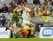 9 July 2006; Ton Aldwell, Antrim, in action against Paul McGinley, Donegal. ESB Ulster Minor Football Championship Final, Donegal v Antrim, Croke Park, Dublin. Picture credit: Pat Murphy / SPORTSFILE
