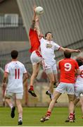 28 June 2014; Paddy Keenan, Louth, in action against Colm Cavanagh, Tyrone. GAA Football All Ireland Senior Championship, Round 1B, Tyrone v Louth, Healy Park, Omagh, Co. Tyrone. Picture credit: Oliver McVeigh / SPORTSFILE