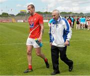 28 June 2014; A dejected Paddy Keenan, Louth, leaves the field after the game. GAA Football All Ireland Senior Championship, Round 1B, Tyrone v Louth, Healy Park, Omagh, Co. Tyrone. Picture credit: Oliver McVeigh / SPORTSFILE